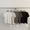 ¡Productos de alta gama R*S de las Trece Líneas de Guangzhou! Camiseta minimalista elegante de manga corta con cuello mao pequeño para mujer, Otoño 2026