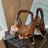 Bolso de mano tejido plisado de alta calidad para mujer, nueva colección de verano 2026, bolso cruzado con correa de cadena para el trabajo