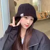 Novo Chapéu de Lã Tricotado Estilo Coreano Outono e Inverno Feminino Tendência Versátil Proteção Quente para Ouvidos Chapéu Bucket Quente Venda por Atacado