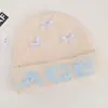 Gorro de alta calidad de mezcla de lana coreana, perfecto para otoño e invierno, hace que tu cara se vea más pequeña, presenta un patrón de jacquard con letras y tiene un ajuste holgado y cómodo