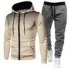 Colección Otoño/Invierno 2026: Sudadera deportiva unisex de lunares con forro polar, conjunto de sudadera con cremallera y pantalones de chándal de color liso para hombre