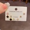 Conjunto de Pendientes Exquisitos de Moda Coreana y Japonesa Versátil de Circonita Flor de Cuatro Hojas de Tres Piezas para Uso Diario Pendientes de Diseño Simple para Mujer
