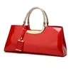 Fabricantes moda europea y americana pegamento ligero charol portátil bolso de mujer hombro diagonal bolso de boda bolso de novia banquete