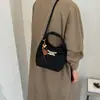 Bolsa Saco Elegante Retrô com Fivela de Camurça para Mulheres 2026 Outono/Inverno Nova Casual Versátil para o Dia a Dia Ombro Único Transversal