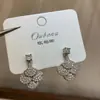 2026 Novo Produto Brincos de Moda com Folha de Ginkgo em Forma de Leque Preenchidos com Zircônia Exquisite, Brincos Clássicos Franceses de Alta Qualidade