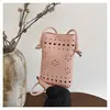 Bolso Pequeño Hueco de Venta Caliente Transfronterizo para Mujer 2026 Nuevo Bolso para Teléfono de Moda Primavera/Verano Bolso Cubo de Cuero Suave Bolso Cruzado Versátil