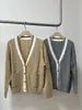 BORBOTIE Ropa de punto para mujer 2026 Primavera y Otoño Nuevo BC Lana de Cachemir Tejido de punto de ochos Bolsillo de color contrastante Cardigan con cuello en V