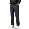 Moda masculina de otoño e invierno: pantalones casuales de pana elegantes y únicos de corte holgado, modernos y sencillos, pantalones largos atléticos versátiles de pierna recta