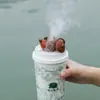 Suministro directo de fábrica marea nacional explosiva fuego viento té bebida tienda de té con leche tetera pequeña mini punta de dedo para fumar tetera pequeña de arena púrpura con mango