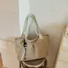 Bolso moderno de lunares de gran capacidad para mujer, nuevo bolso de hombro casual y relajado 2026, adecuado para estudiantes universitarios y personas que van al trabajo