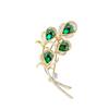 Nuevo broche de pluma de pavo real esmeralda de alta gama, lujo atmosférico, corsage de pluma de fénix, accesorios de celebridad de Internet para abrigo
