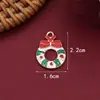 Llaveros navideños más vendidos transfronterizos con tarjetas de bendición, con diseños de Santa Claus y muñeco de nieve de dibujos animados, perfectos como adornos temáticos navideños