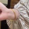 Pulsera de oro de estilo antiguo nuevo estilo chino retro estilo chino pulsera de anillo liso de alta calidad que combina con todo pulsera lisa pulsera dorada