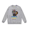 Marca moderna de estilo japonês com estampa de desenho animado de cabeça de macaco, nova blusa de moletom casual de gola redonda em terry de corte solto para homens e mulheres, adequada para adolescentes no outono e inverno