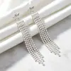 Aretes de clip para orejas sin perforación, estilo europeo y americano, con cadena de garra de diamantes completos y borla, para mujer, aretes de gancho para orejas de lujo ligero, ultra brillantes, de moda, para fiesta de bodas