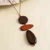 Cuerda de cuero retro europea y americana, acrílico y collares geométricos de madera, cadenas para suéter vintage de alta gama transfronterizas, joyería de moda nicho