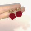 Pendientes de botón con lazo de rosa roja flocado de otoño e invierno de alta calidad, ligeros y de lujo, con diseño versátil de nicho para mujer, nuevos pendientes