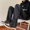 Pantalones casuales rectos con cremallera de diseño de verano para hombre, tendencia transfronteriza, estilo retro americano, jeans de pierna ligeramente acampanada