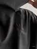 Camiseta de seda gelada de gola alta em tom escuro para homens, de manga curta, com um design único, novo estilo chinês, corte solto, fresca e casual