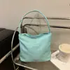 Corea del Sur Mucu y Ébano Moda Bordado Alta Elasticidad Impermeable Nailon Versátil Casual Bolso Cruzado de Hombro