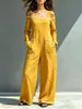 Macacão de um ombro com blocos de cor para mulheres, modelo 2026, disponível em estoque, para uso transfronteiriço, corte solto com bolsos grandes, pernas largas, comprimento até o chão, macacão de alça