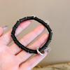 Pulsera de estilo chino retro con hebilla de seguridad negra para mujer, pulsera de cuentas de doble círculo con nicho que combina con todo, joyería de mano del mismo estilo para parejas.