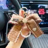 Nuevo Llavero Creativo de Camelia con Lazo Estilo Elegante Chanel Colgante Decorativo Coreano para Niñas