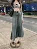 Falda vaquera estilo Hong Kong retro para mujer, nuevo modelo 2026, dobladillo deshilachado, longitud media, tiro alto, corte A adelgazante, falda vaquera ajustada