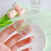 Produto afiação novo acrílico cor Aurora grampo de cabelo laço design de moda sentido adorno de cabeça grampo feminino explosão atacado