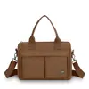 Nueva Bolsa Cruzada Versátil de Color Sólido con Múltiples Bolsillos Transfronteriza para Viajes Diarios y Uso Casual, Bolso de Hombro Simple de Nylon