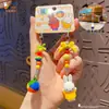 Llavero Colgante Auténtico Conejo Miffy Nariz Pequeña Femenino Lindo DIY Pareja Cadena de Teléfono Móvil Anillo Colgante de Mochila Escolar