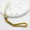 2025 Nuevo Otoño e Invierno Hecho a Mano Tejido Lanyard para Teléfono Móvil Gato de Dibujos Animados Estilo Muñequera Largo Portátil Colgante para Coche