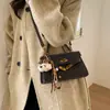 Bolsa Kelly Retrô de Nicho para Mulheres 2026 Nova Tendência Moda Versátil Bolsa de Mão Pequena Quadrada Elegante Bolsa de Ombro Transversal