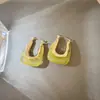 Brincos de fivela de orelha geométrica de resina de cor doce retrô nicho de moda europeu e americano simples elegante celebridade da Internet brincos de alta qualidade para mulheres