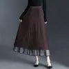 Falda plisada estampada con fondo negro para mujer 2026 Otoño Nueva falda de cintura alta adelgazante de doble cara con caída elegante y dobladillo grande