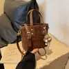 Bolsa de Mão Estilosa e Versátil Estilo Balde 2026 Outono/Inverno Nova Retro Sensação de Alto Padrão Bolsa de Ombro Bolsa Transversal Casual para o Dia a Dia