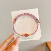 Pulseira de Alta Qualidade Estilo Zongzi 2026 Nova para o Festival do Barco-Dragão, Pulseira de Fio Colorido Estilo Xizang com Pingente de Paz, Corda de Mão Estilo Étnico