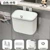 Cubo de basura de pared para uso doméstico, con tapa, diseñado para colgar en gabinetes, específicamente para residuos de cocina, y adecuado para usar en baños