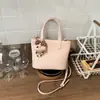 Bolsa de Hombro Cruzada de Moda Coreana Transfronteriza Nicho Nueva Primavera 2026 Bolso de Mano de Gama Alta Cubo para Mujer Casual