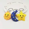 Llavero Creativo Cara Sonriente Sol Luna Estrellas PVC Goma Suave Colgante de Bolsa Muñeco Suministros para Máquinas Venta al por Mayor