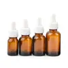 Botella de aceite esencial de 10 ml botella secundaria japonesa nueva botella de vidrio marrón de 30 ml botella con gotero para líquido de esencia de 15 ml