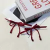 Lazo de cinta roja Collar con borla de cristal temperamento Corea del Sur Celebridad de Internet Pendientes exagerados para fiesta de graduación Pendientes para mujer