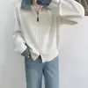Suéter de moda estilo europeu e americano com lapela jeans e zíper duplo para mulheres, novo cardigã de tricô solto casual com blocos de cor para outono e inverno