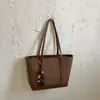 Nova bolsa tote casual feminina de grande capacidade para ir ao trabalho, bolsa de ombro vintage de alta aparência, moda 2026