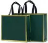Bolsa no tejida en stock Impresión a color de película Bolso de mano para llevar ropa a domicilio Regalo publicitario Bolsa de compras promocional al por mayor
