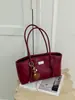 Bolso de axila para mujer elegante y a la moda, nuevo modelo de primavera, versátil, único, simple, color liso, gran capacidad, bolso de hombro de moda para el día a día