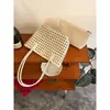 Bolso tipo cesta tejido hueco de alta gama estilo coreano, diseño único, versátil bolso de hombro y de mano, adecuado para ir al trabajo