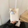 Bolso Cubo Nuevo y Elegante de Nicho Transfronterizo Verano 2026 para Mujer, Bolso Cruzado, Bolso de Hombro, Bolso de Teléfono de Color Sólido a la Moda