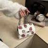 Bolso simple de tendencia de nicho estilo coreano 2026 invierno nuevo de nicho cereza dulce moda casual bandolera para mujer