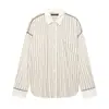 Novo Conjunto de Moda Outonal Europeu e Americano para Mulheres, Camisa de Manga Longa Listrada Color-Block Versátil e Calças Casuais